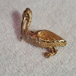 Crane brooch